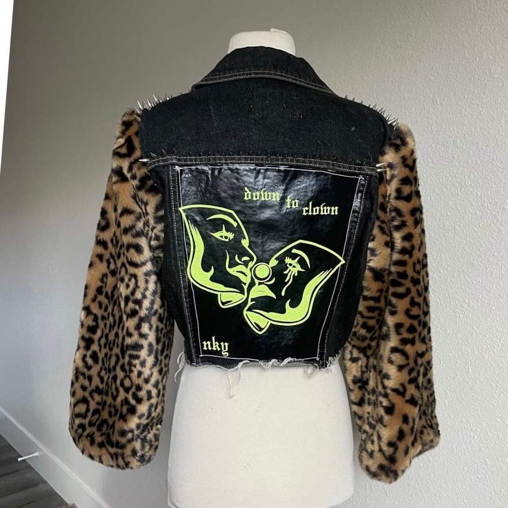 Cropped studded black denim with leopard fur sleeves